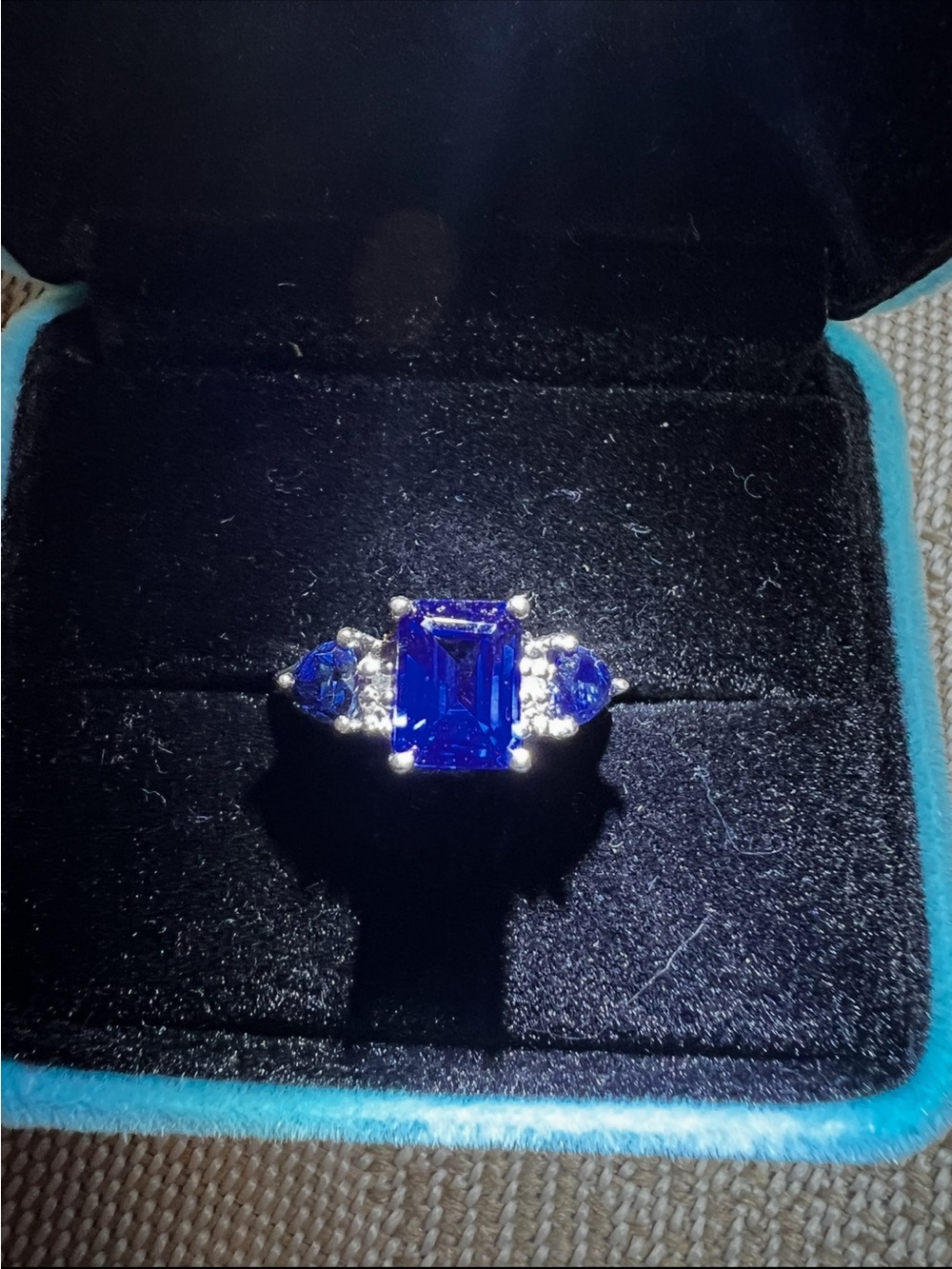 Sapphire Emerald-Cut Crystal Ring with Side Stones. Sterling Silver stamped
